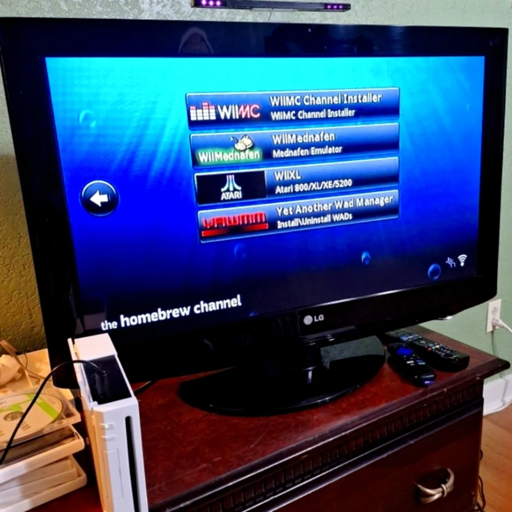 Nintendo Wii Console with White Console and Black TV Display